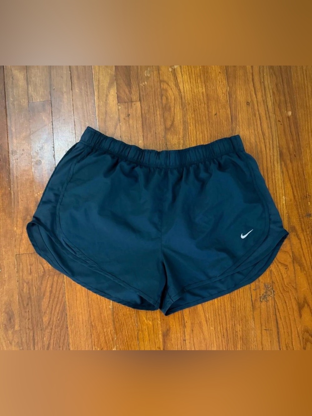 Nike Women's Navy Blue Athletic Shorts with Reflective Swoosh